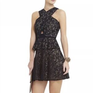 BCBG Max Azria Tara black lace cutout dress with a cross-neck design